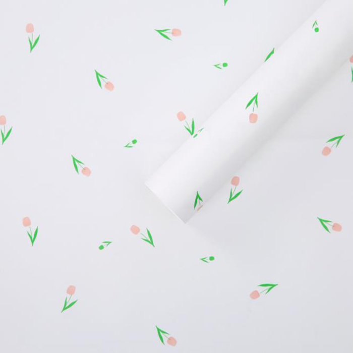 芸術的な言葉が描かれた花束の厚い包装紙