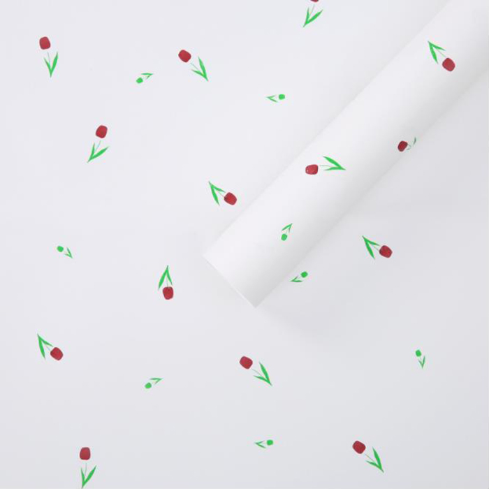芸術的な言葉が描かれた花束の厚い包装紙