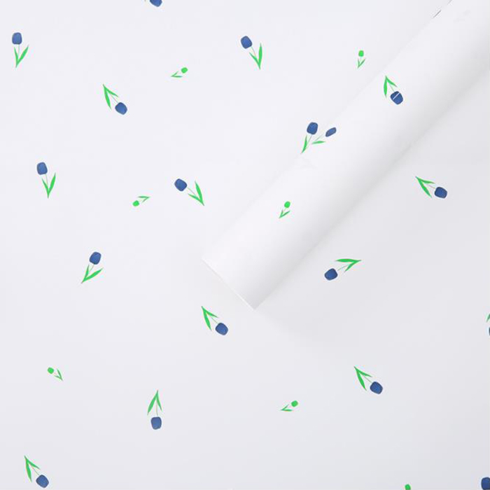 芸術的な言葉が描かれた花束の厚い包装紙