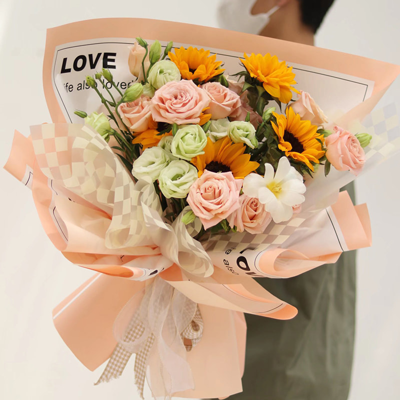 滑らかな文字の花の包装紙